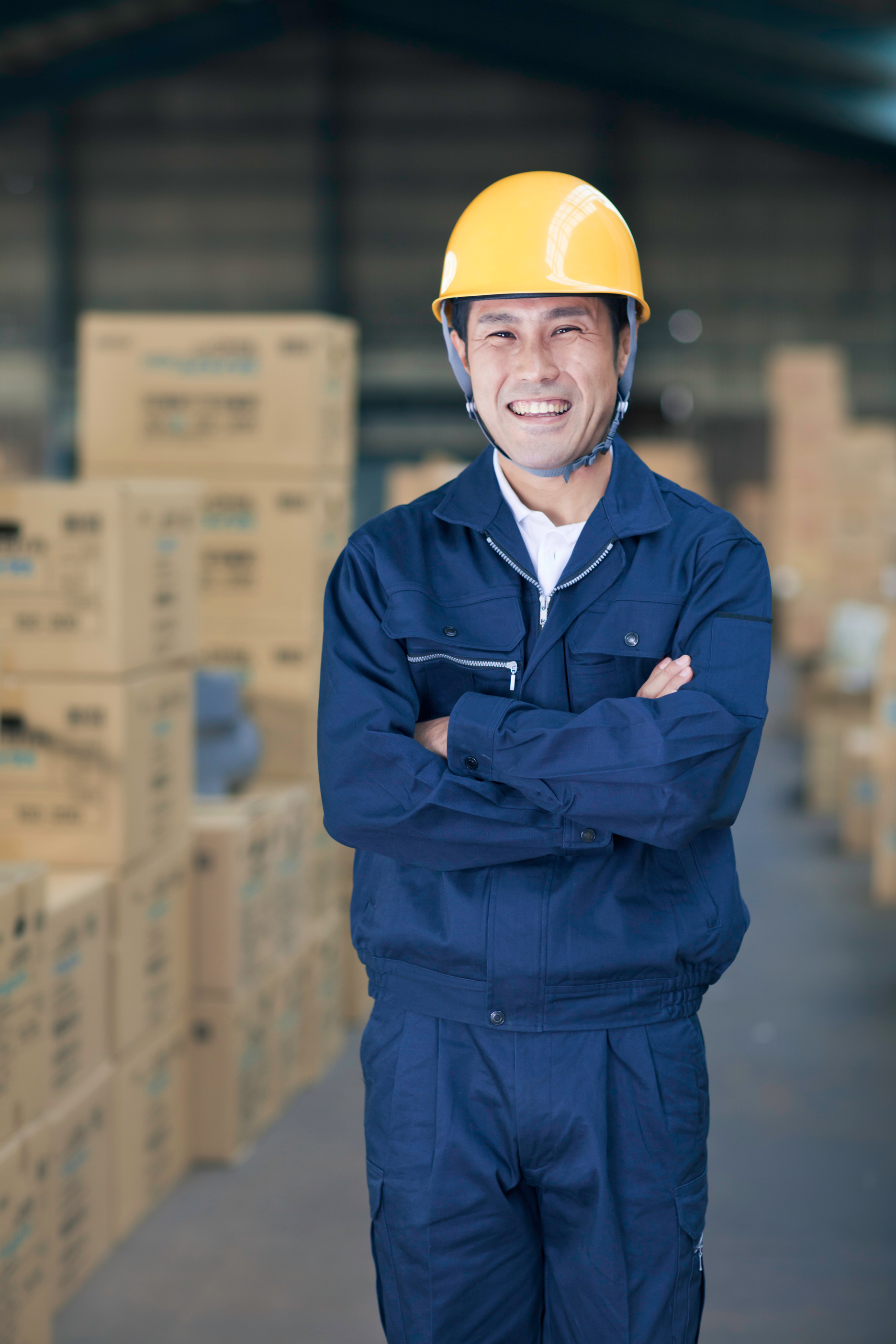 Japanese Worker in Warehouse
